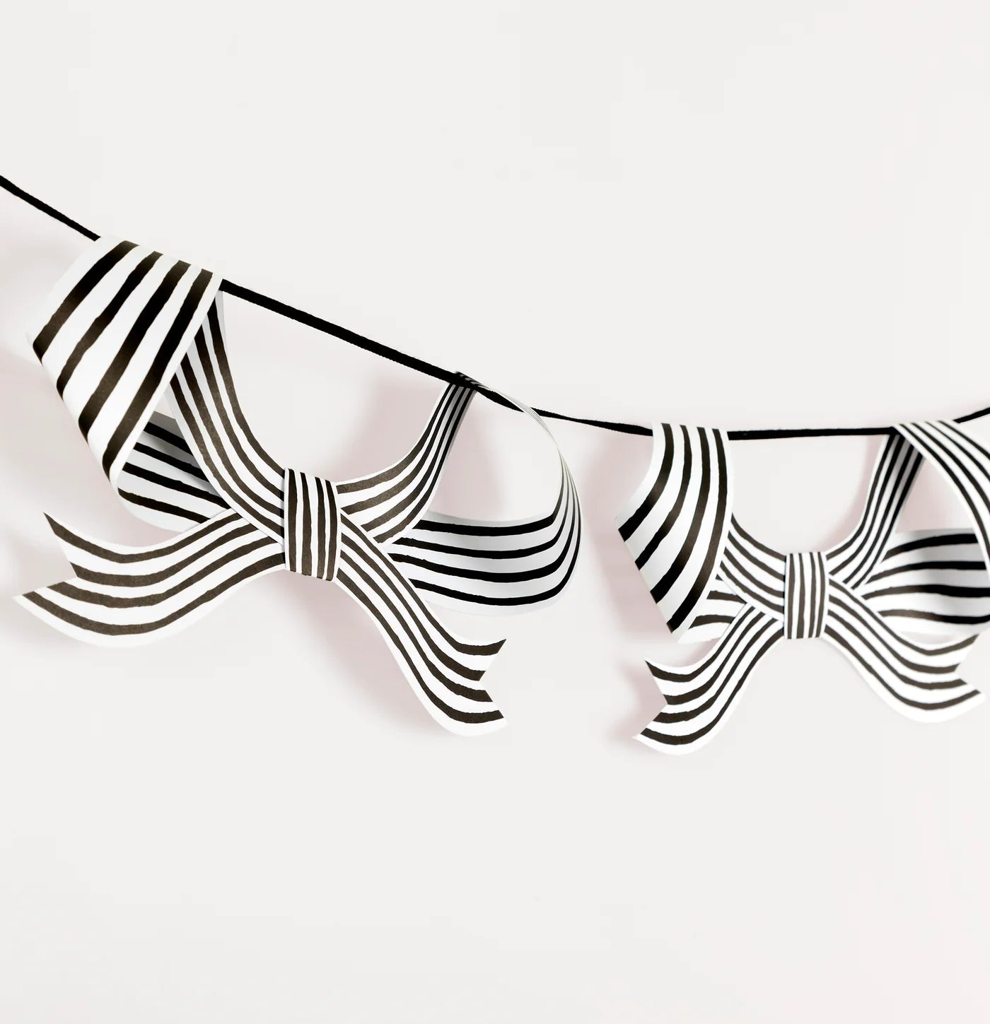 COMING SOON: Meri Meri Party Black & White Stripy Bow Garland - bubblegum market