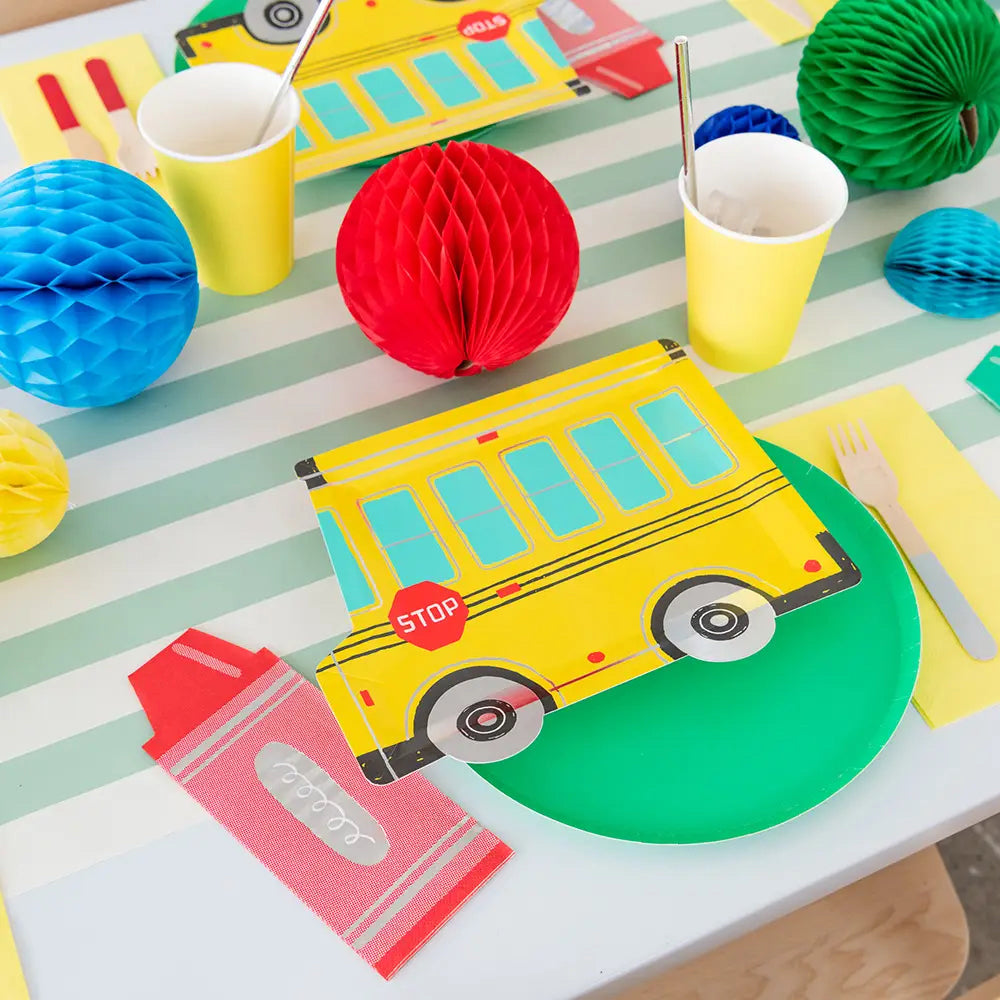 back-to-school-party-supplies-yellow-bus-paper-plates-crayons-napkins-styled