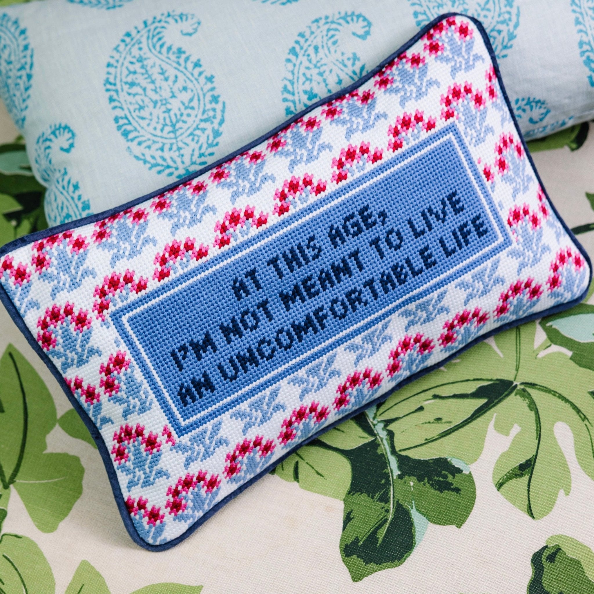 UNCOMFORTABLE Needlepoint Pillow - bubblegum market