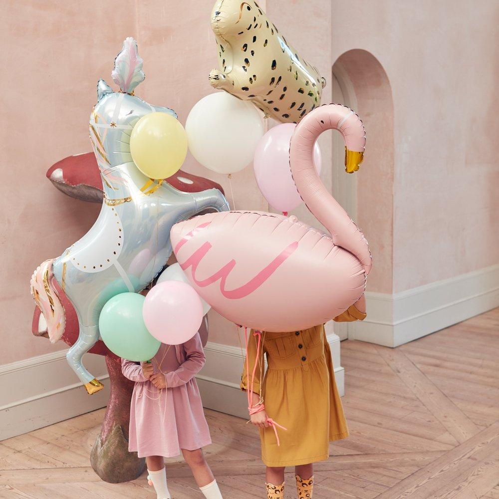 meri-meri-party-children-holding-balloons-flamingo-horse-cheetah
