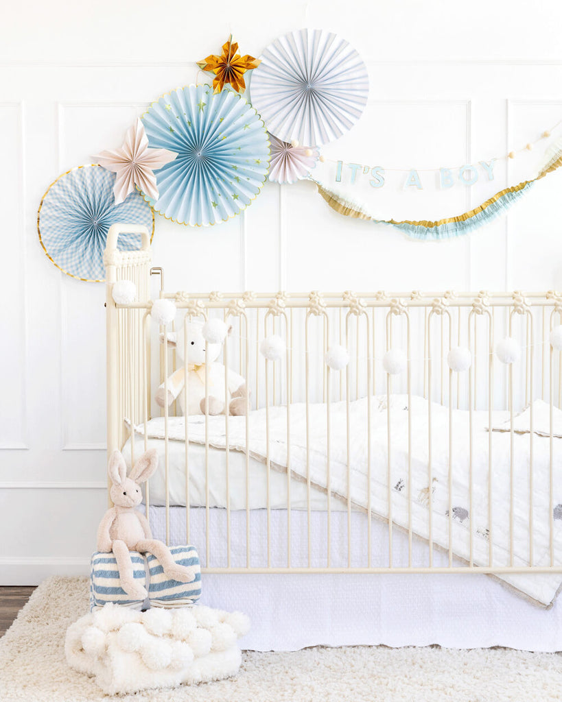 my-minds-eye-baby-shower-blue-crepe-paper-banner-streamers-styled-in-nursery