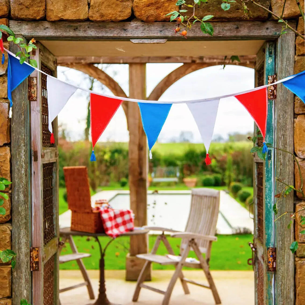 red-white-and-blue-4th-of-july-party-banner-fabric-bunting-talking-tables-outdoor-styling