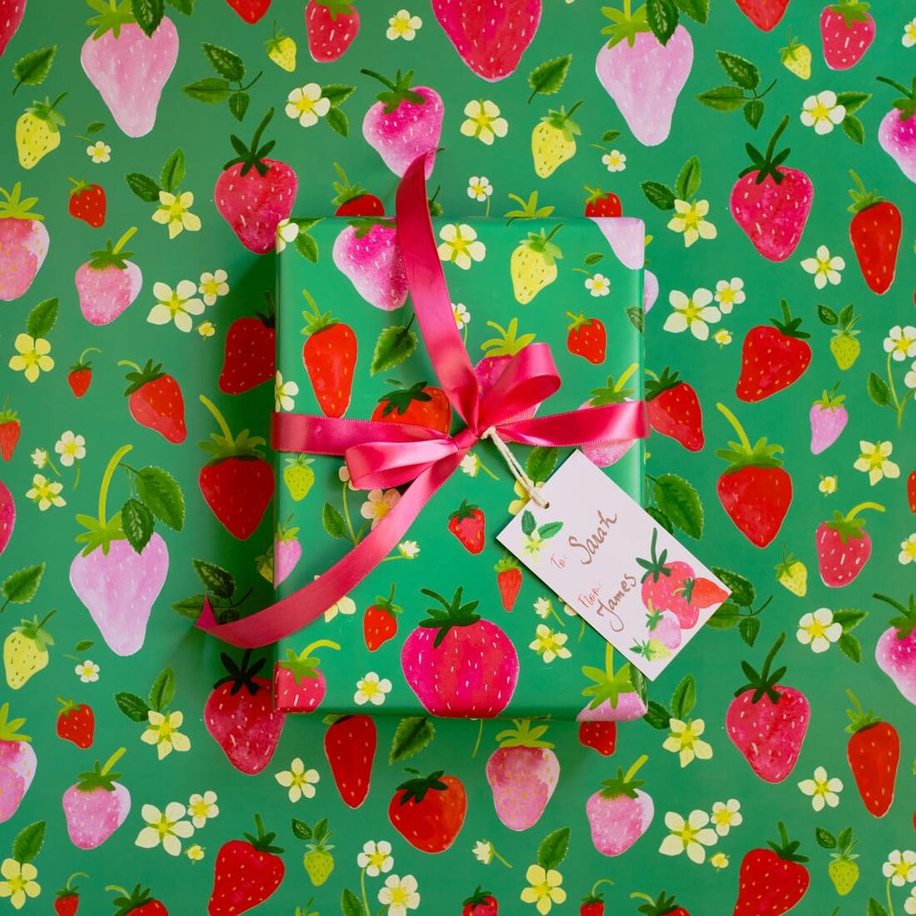 strawberries-wrapping-paper-strawberry-gift-wrap-with-green-background-wrapped-and-flat
