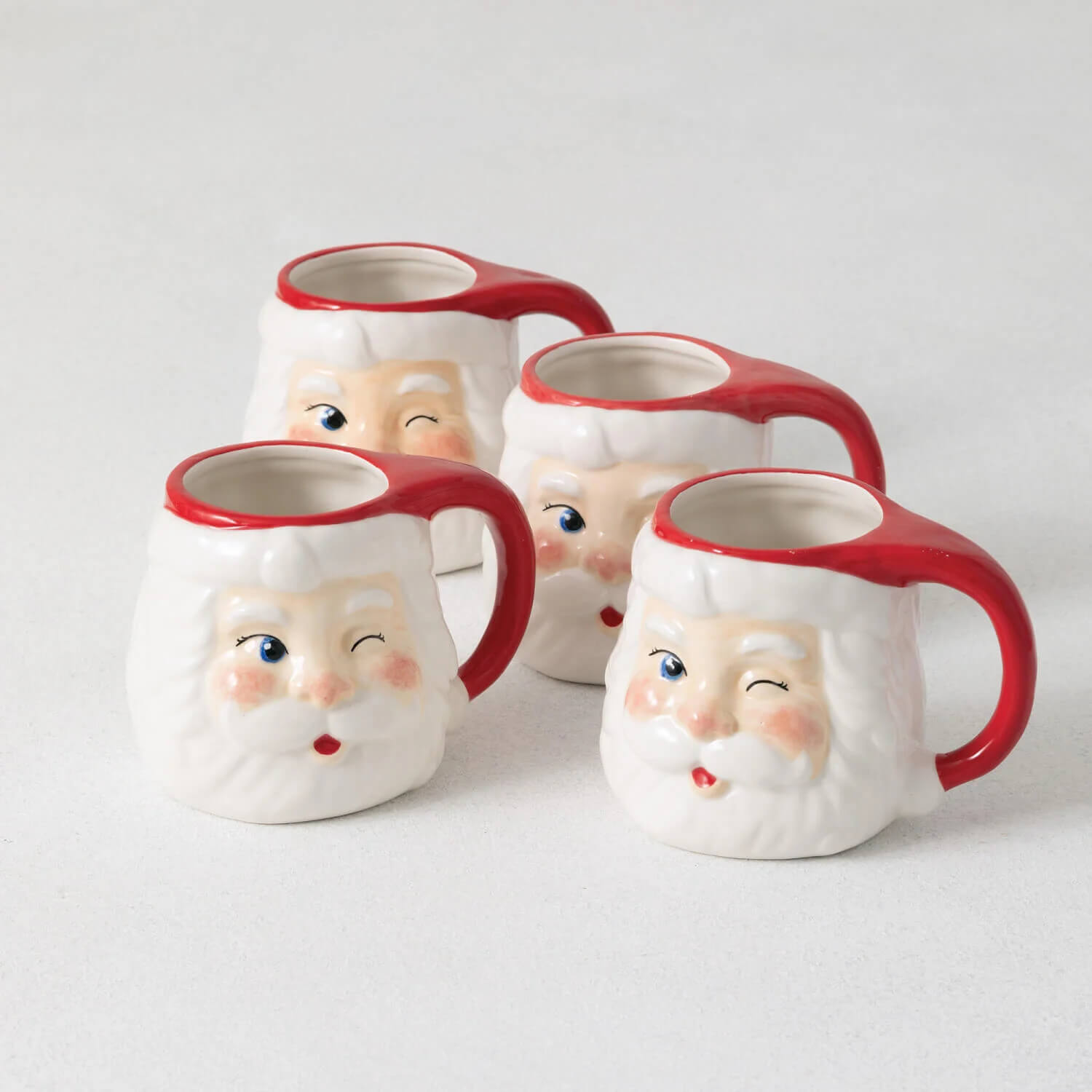 https://www.bubblegummarket.com/cdn/shop/products/sullivans-christmas-winking-santa-mug-set.jpg?v=1637301712